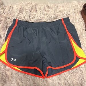 Under Armour workout shorts with liner and drawstrings. Size medium.